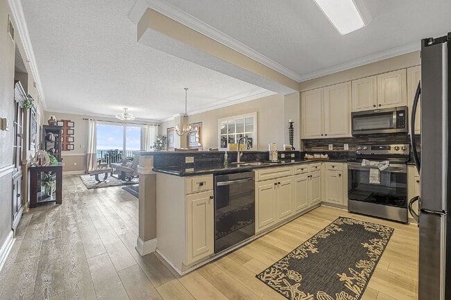 Building Photo - Available for a 7-12 month lease, Unit 208 has a beautiful oceanfront setting.