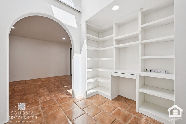 Building Photo - Southwestern Charm Meets Modern Comfort — 2BR/2BA Condo with Access to Shared Pool!