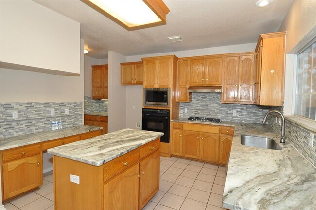 Building Photo - 13304 Bosswood Dr