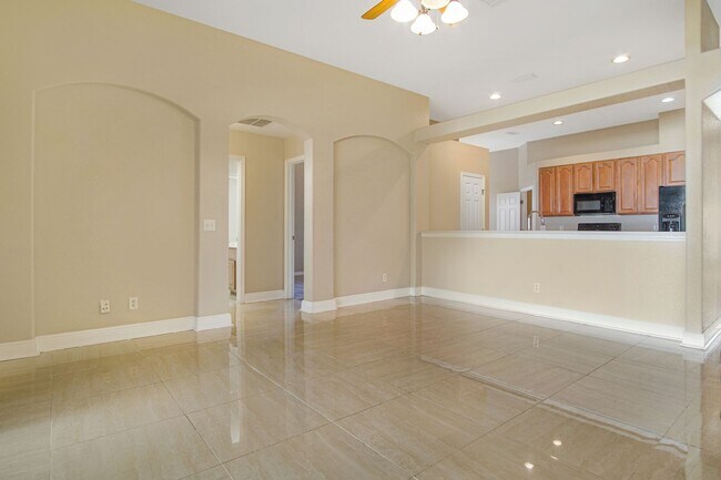 Building Photo - Move-In Ready Home with Open Layout and Op...