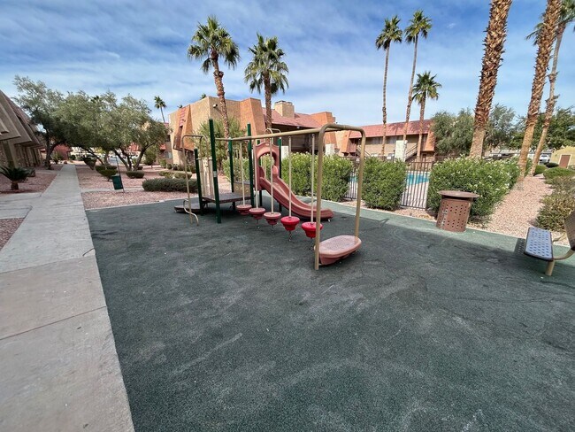 Building Photo - Stylish condo with new upgrades, tennis courts, and pool access