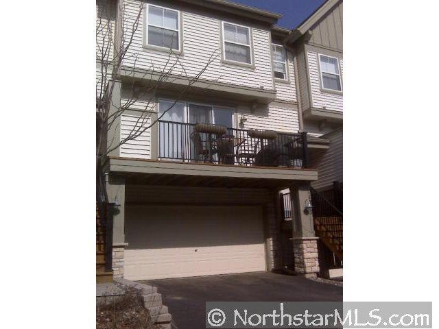 Front of house with 2-car Garage and large balcony - 11217 Kinsley St