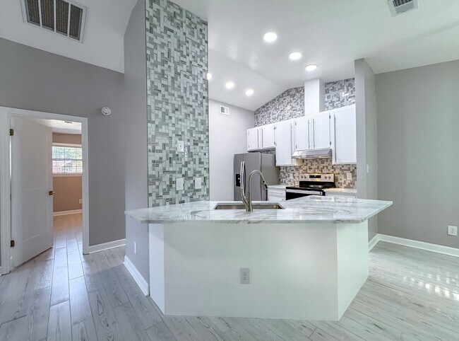 Building Photo - MODERN & Redone 1/1 w/ Tile Floors Throughout, Stainless Appliances, Granite Counters, Washer/Dry...