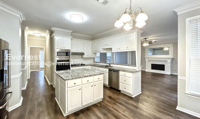 Building Photo - Spacious 4-Bed Home with Garage & Modern Amenities / Pet Friendly / Vouchers Accepted / Available...