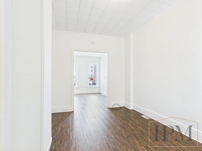 Building Photo - Available Now! Spacious 5 Bedroom Home Loc...