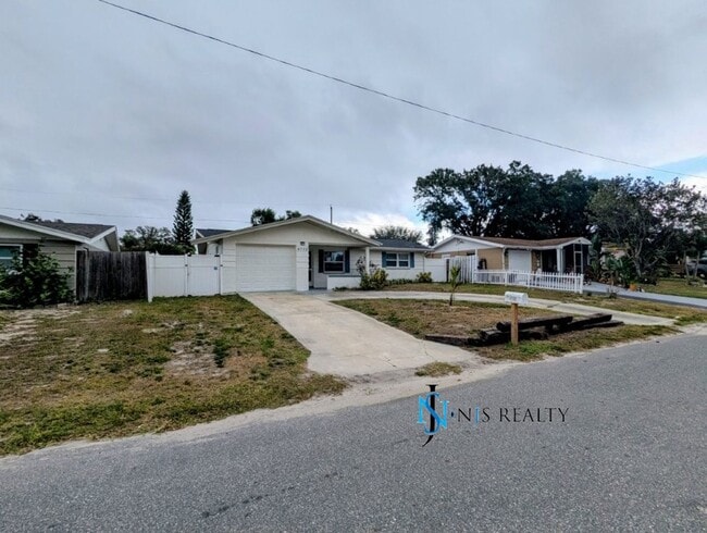 Building Photo - REDUCED!! NEW FLOORS, NEW PAINT INSIDE & O...