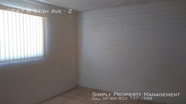 Building Photo - 9847 N 11th Ave