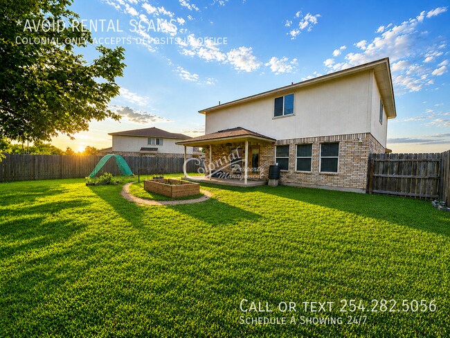 Building Photo - 5406 Boot Scootin Ct
