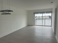 Building Photo - 8560 N Sherman Cir