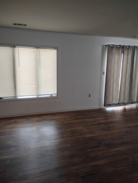 Plenty of light in the living and dining room. - 334 Shenandoah Cir