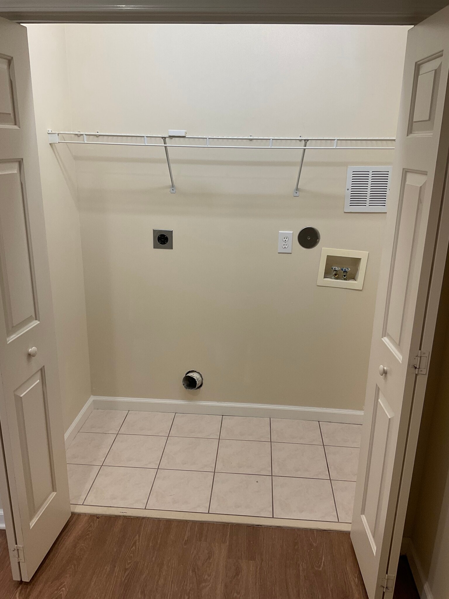 Designated washer/dryer room, with shelving - 10 Hillsboro Dr