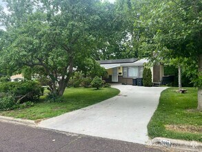 Building Photo - Charming 4 Bed 2.5 Bath Home With Nice Woo...