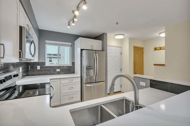 Building Photo - Two-Story Condo Near Delridge Library with Private Courtyard & Easy Downtown Access