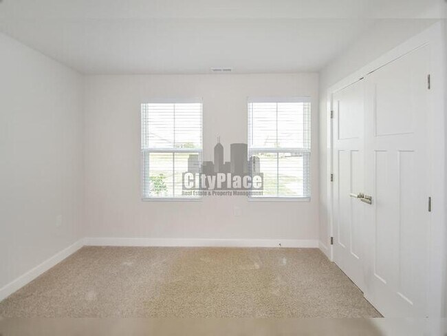 Building Photo - 7009 E Bean Blossom Dr
