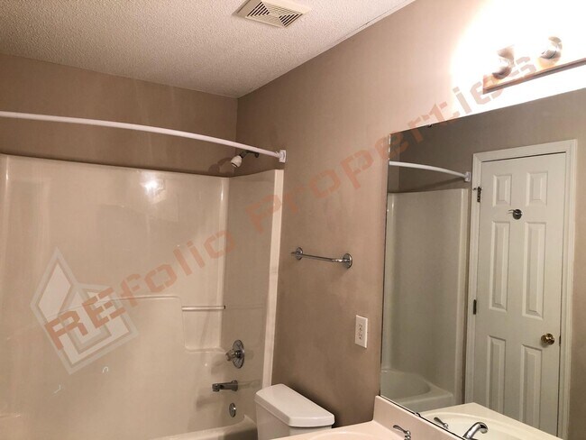 Building Photo - Elegant 4 Bedroom 2.5 Bath House w/ Primary Suite on 1st Floor + a Fenced-in Backyard @ Park Vill...