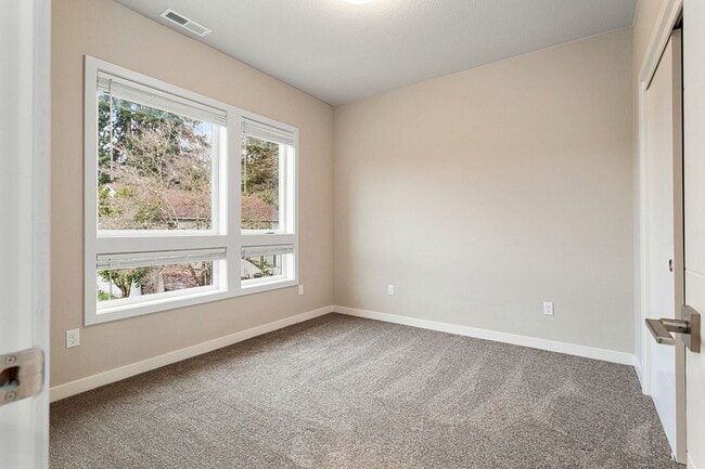 Building Photo - 2022 Build -Almost Brand New 3 br 2.5 bth Home with hardwoods, fenced yard and backs to greenspace !