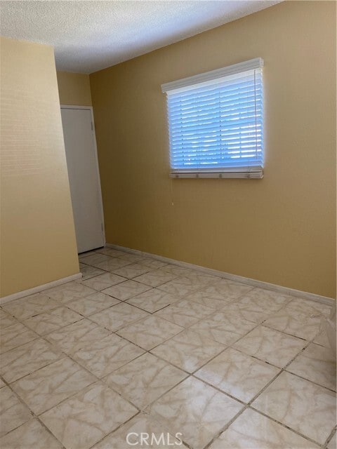 Building Photo - 4856 Santa Ana St