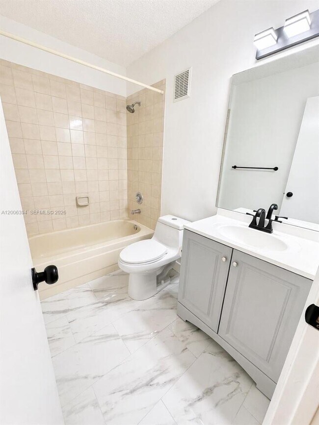 Building Photo - 8590 NW 3rd St