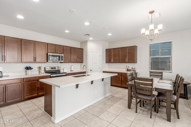 Building Photo - 3872 N 103rd Ave