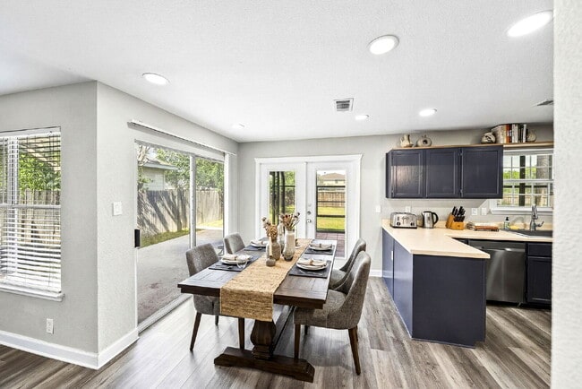 Building Photo - A Waterfall Shower, a Sunroom, and a Story Worth Coming Home To