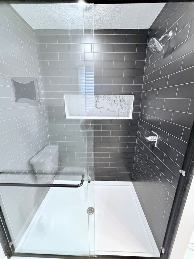 Building Photo - Spacious 4-Bedroom Home with Pond Views & EV-Ready Garage – Bloomington!!