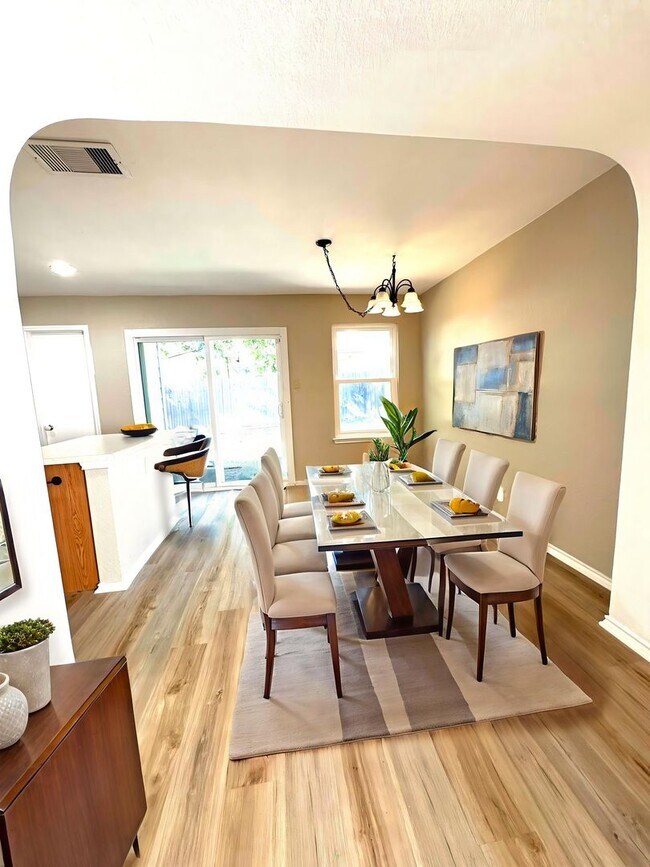 Building Photo - NEW PAINT, FLOORING, APPLIANCES & ROOF  | ...