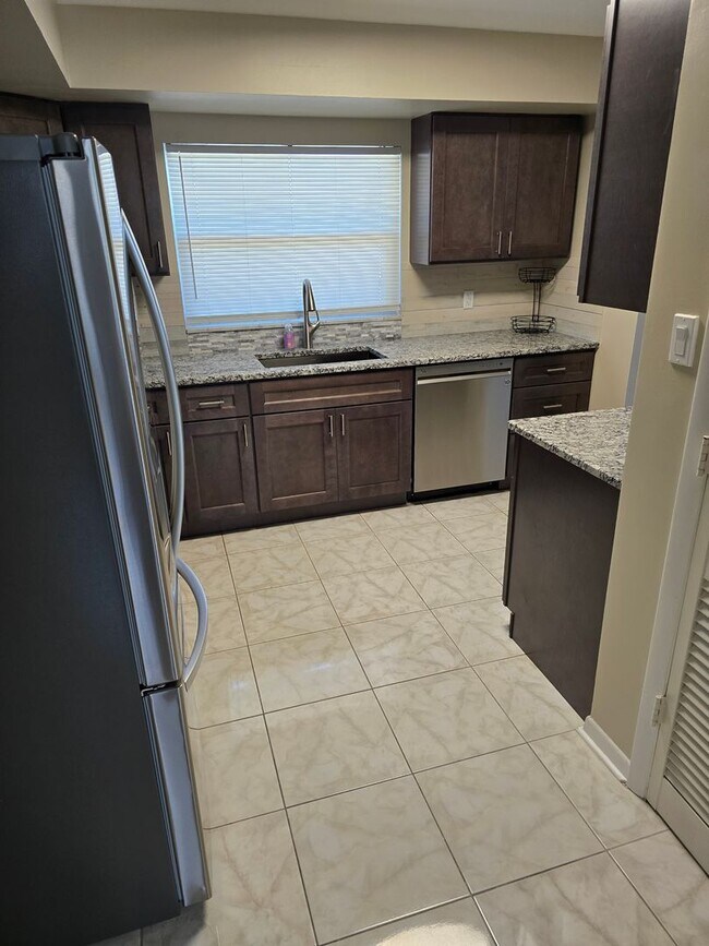 Building Photo - Live the Florida Lifestyle – Turnkey 2BR H...