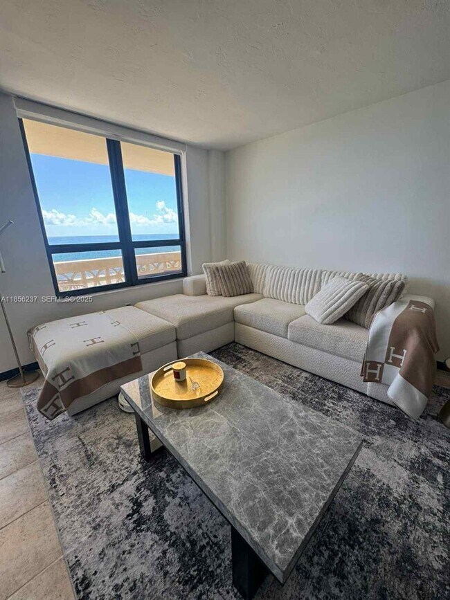 Building Photo - 10185 Collins Ave