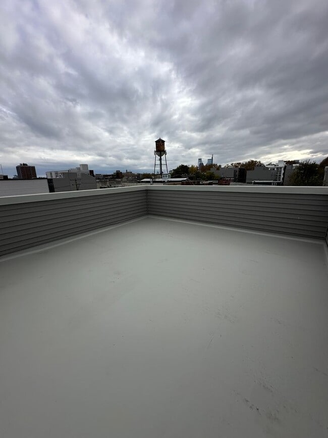 Building Photo - Recently Constructed, Modern 3 Bed / 3 Bath Bi Level Apartment Near Temple — Private Rooftop + Ba...