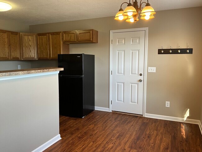 Kitchen and Side Door to the Driveway - 1925 Levy Dr