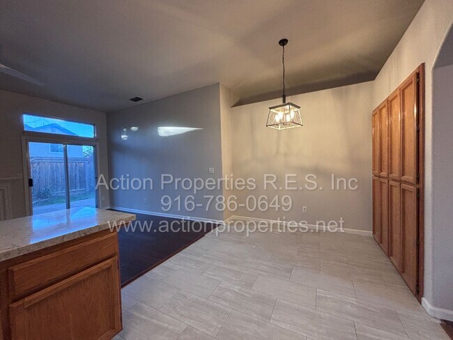 Building Photo - Updated 4 Bed, 2 Bath - 3 Car Garage - New Flooring - Close to Schools, Parks, and Shopping!