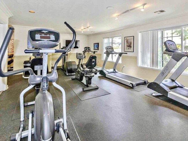 Building Photo - Beautifully Remodeled and Updated Upstairs Condo Unit in the Private & Gated Vista Way Village Co...