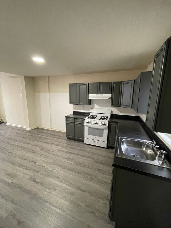 Building Photo - Four Bedroom House For Rent