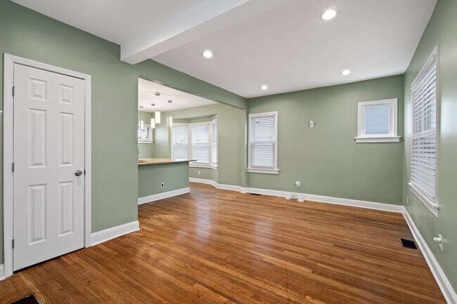 Living room featuring ample recessed lighting and coat closet - 4517 Tracy Ave