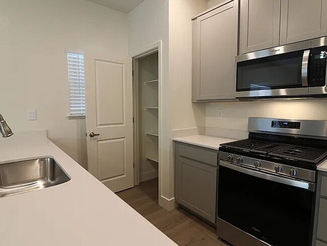 Building Photo - BRAND NEW - GRANITE - STAINLESS - LVP - CE...