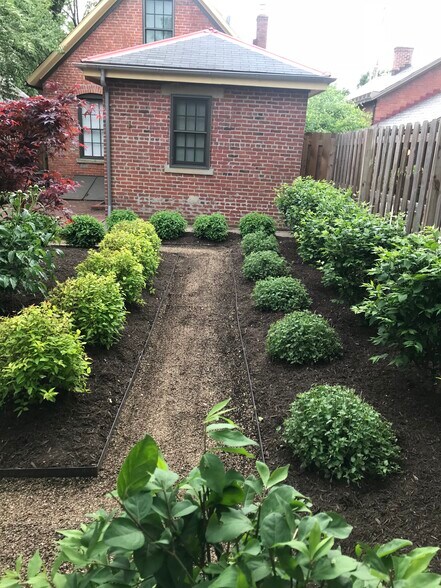 Back yard with walkways back - 628 S 3rd St
