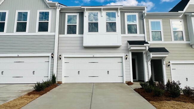 Primary Photo - BRAND NEW & Beautiful Townhome with 2 car ...