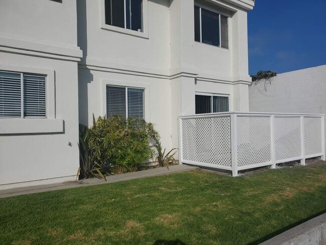FRONT OF UNIT WITH PATIO - 3207 S El Camino Real
