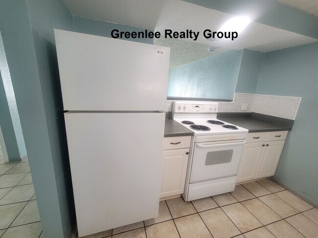 Building Photo - Cute 1/1 Apartment with Tile Floors & Private Patio!!