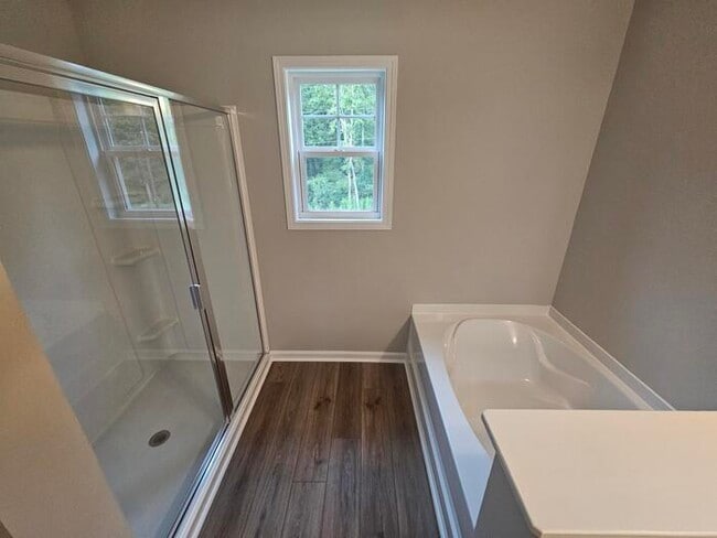 Building Photo - 1 year old 5 bedroom home w community pool!