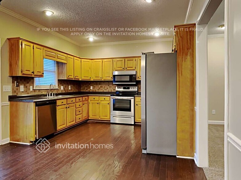 Building Photo - 4881 Tree Tops Dr