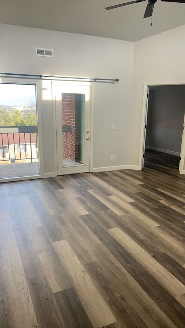 Building Photo - Fun and Stylish Living at Madison Manor! Top-Floor Condo with Vaulted Ceilings and Skylights