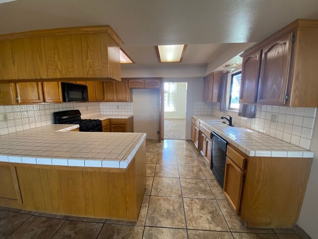 Building Photo - Get ready for Summer in this 3 BD 2 BA SW home with a Pool on a corner lot