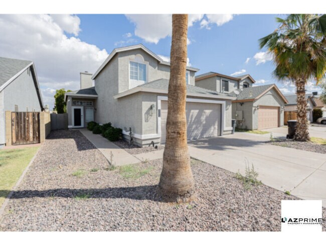 Building Photo - From The Moment You Arrive, This Gorgeous Remodeled 3/2.5 Peoria Home Captivates With Its Sun-Drench