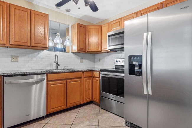 Building Photo - 2BR 2BA Villa Available Now On Top of the Word!