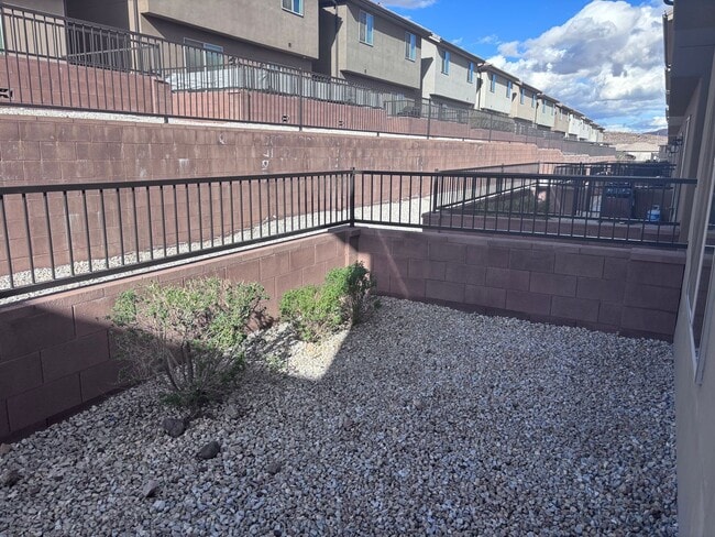 Building Photo - 4bd | 2.5 Bath | 2 Car Detached Desert Canyon Townhome Now Available