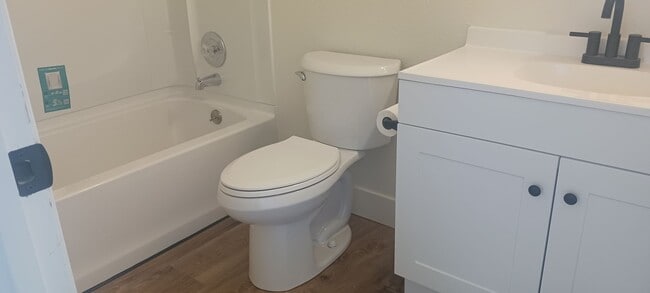 Building Photo - Updated 3 bedroom with A/C and Yard