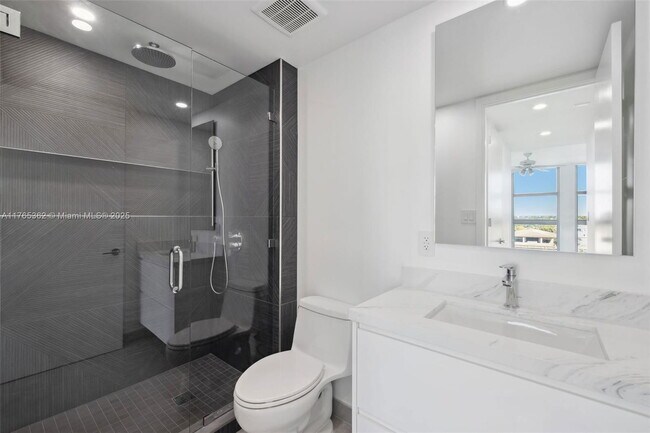 Building Photo - 5065 Collins Ave