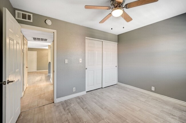 Building Photo - GATED COMMUNITY CONDO WITH BRAND NEW UPGRA...