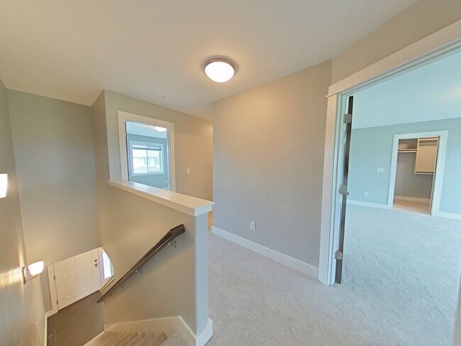 Building Photo - Stunning 3-bedroom, 2.5-bathroom condo with attached 2 stall garage!